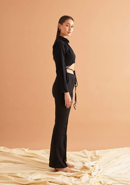 ASOS DESIGN low rise flare trouser with strap detail and ruched waist in  black
