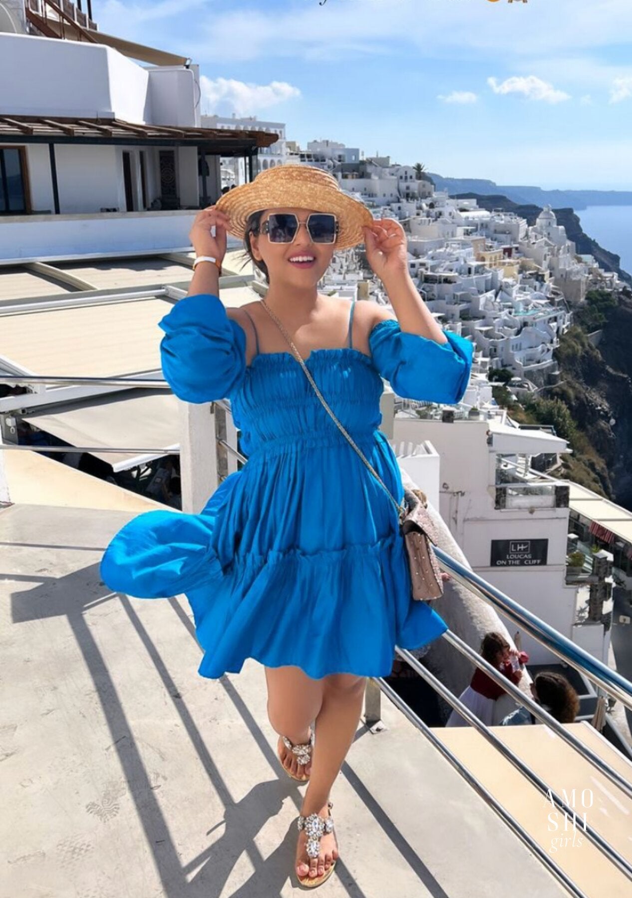 Tina Dhanak As seen in our Dita Dress with detachable sleeves (Blue)